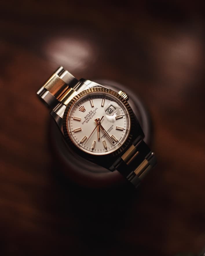 Two-tone luxury watch with white dial